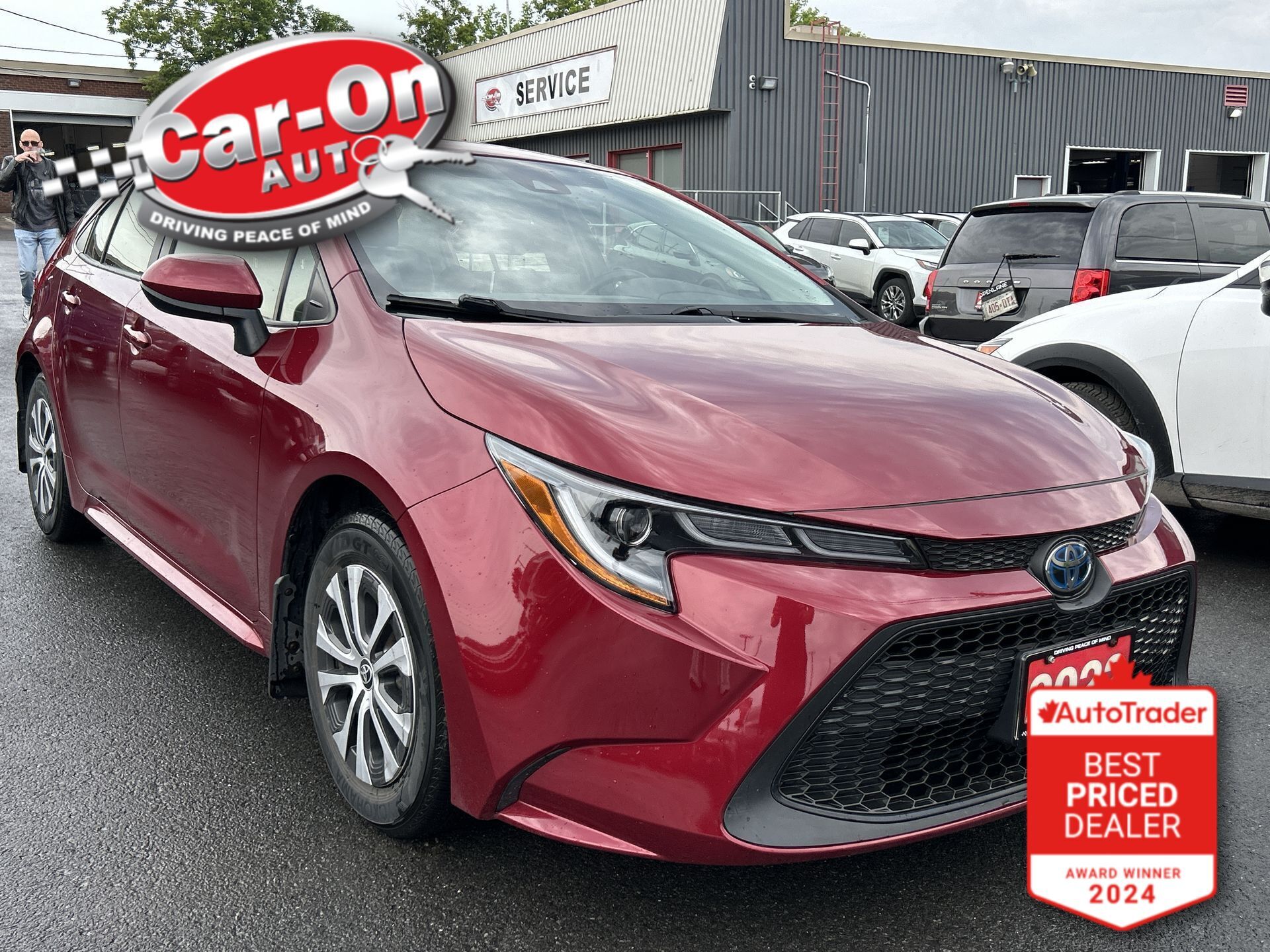 Red 2022 Toyota Corolla Hybrid Sedan Automatic