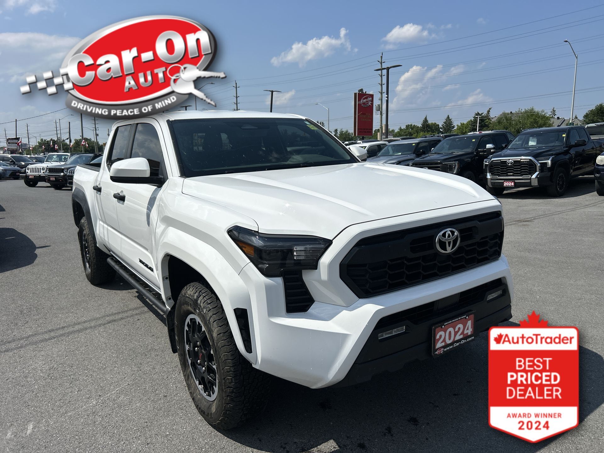White 2024 Toyota Tacoma Pickup Truck Four-Wheel Drive Manual
