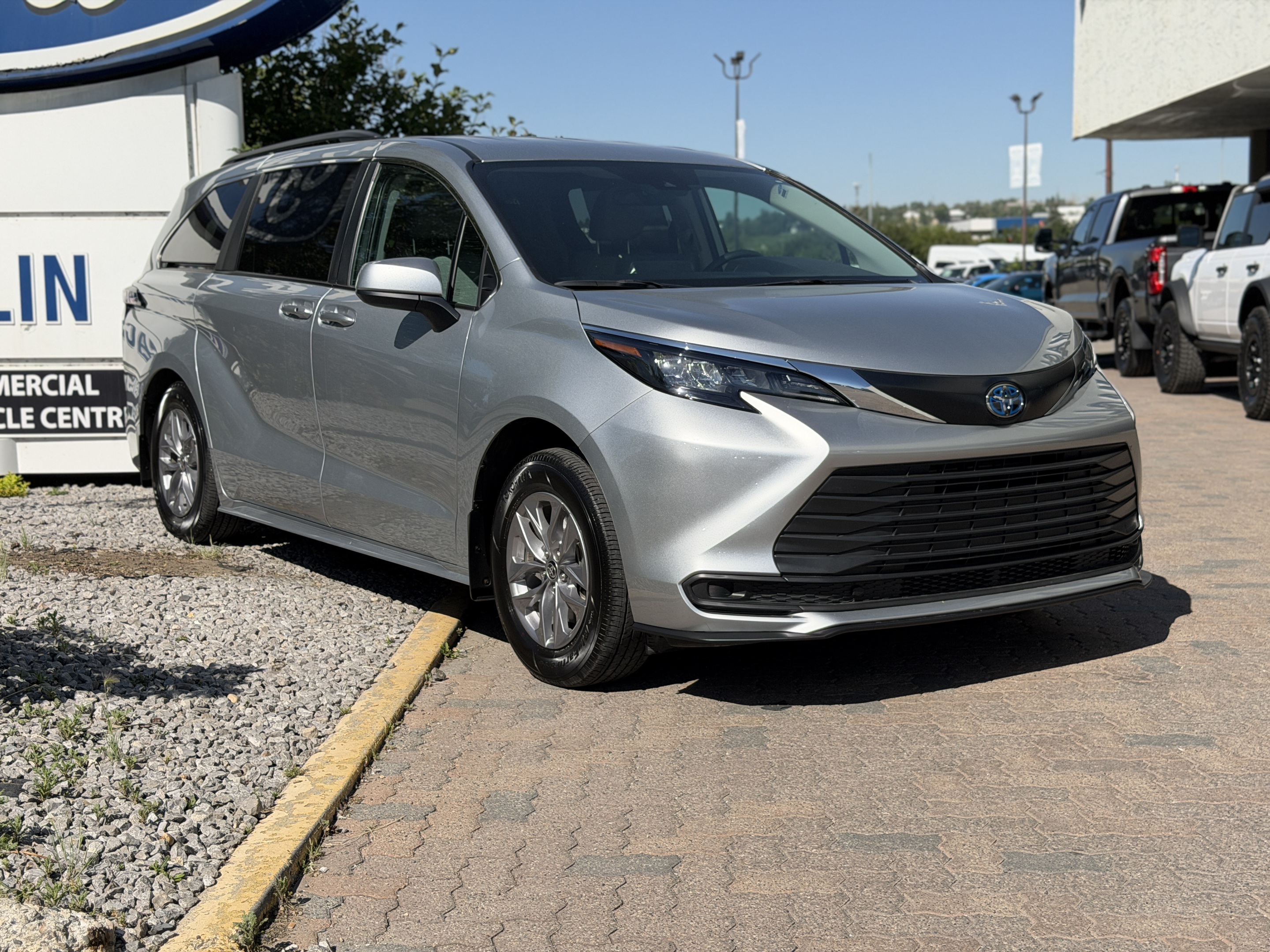 Silver 2024 Toyota Sienna Minivan All-Wheel Drive Continuously Variable Transmission