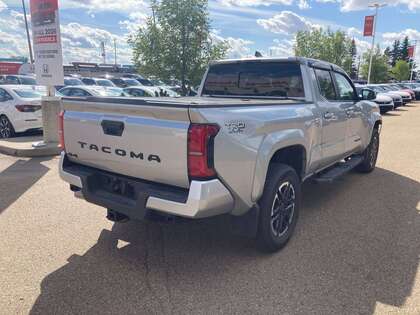used 2024 Toyota Tacoma car, priced at $50,900