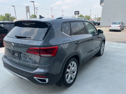 used 2022 Volkswagen Taos car, priced at $28,622