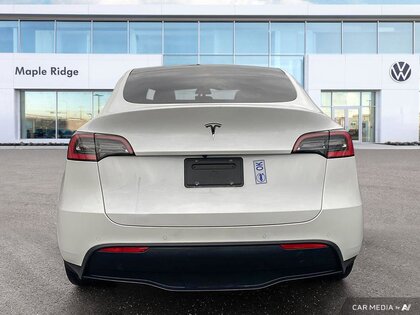 used 2021 Tesla Model Y car, priced at $37,094