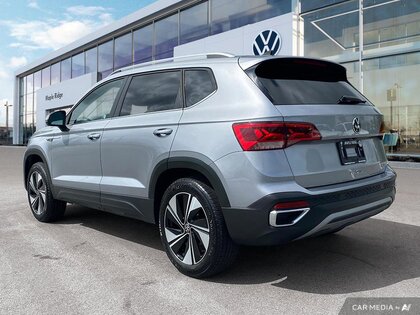 used 2024 Volkswagen Taos car, priced at $34,994