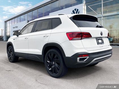 used 2024 Volkswagen Taos car, priced at $38,489