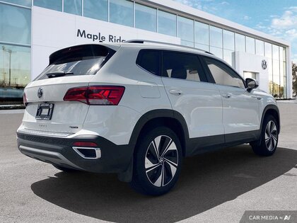 used 2024 Volkswagen Taos car, priced at $35,298