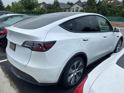 used 2024 Tesla Model Y car, priced at $54,399