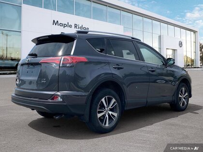 used 2018 Toyota RAV4 car, priced at $28,297
