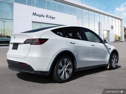 used 2024 Tesla Model Y car, priced at $53,399