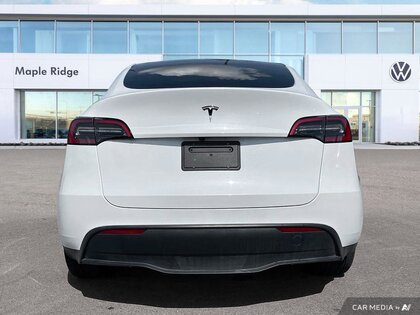 used 2024 Tesla Model Y car, priced at $53,399