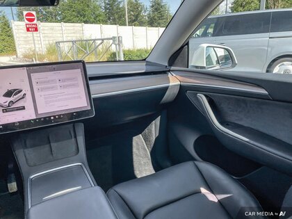 used 2024 Tesla Model Y car, priced at $53,399