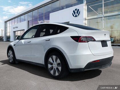 used 2024 Tesla Model Y car, priced at $53,399
