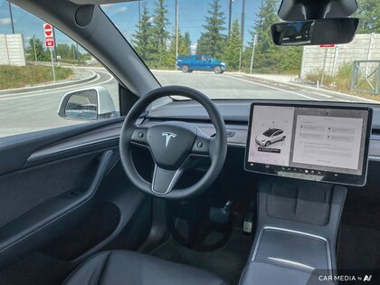 used 2024 Tesla Model Y car, priced at $53,399