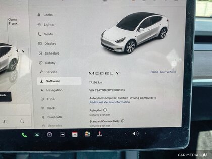 used 2024 Tesla Model Y car, priced at $53,399