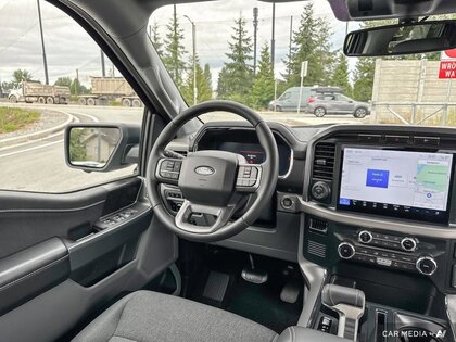 used 2024 Ford F-150 Lightning car, priced at $57,849