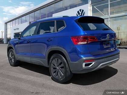 used 2022 Volkswagen Taos car, priced at $27,199