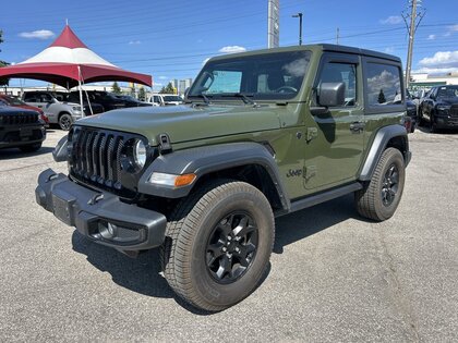 used 2023 Jeep Wrangler car, priced at $34,500