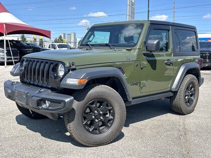 used 2023 Jeep Wrangler car, priced at $34,500