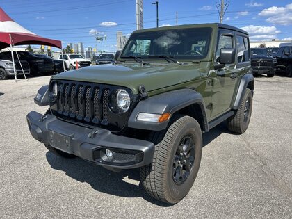 used 2023 Jeep Wrangler car, priced at $34,500