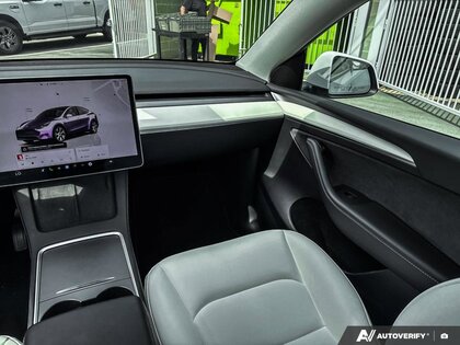 used 2024 Tesla Model Y car, priced at $53,864