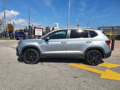 used 2023 Volkswagen Taos car, priced at $30,495