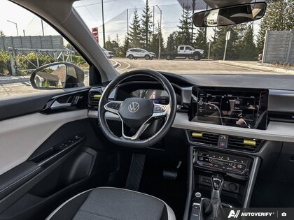 used 2025 Volkswagen Taos car, priced at $32,099