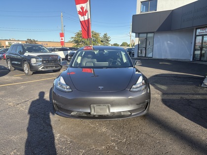 used 2018 Tesla Model 3 car, priced at $23,950