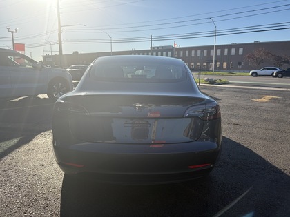 used 2018 Tesla Model 3 car, priced at $23,950