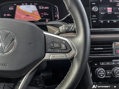 used 2023 Volkswagen Taos car, priced at $30,598