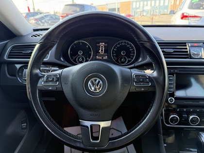 used 2014 Volkswagen Passat car, priced at $11,950