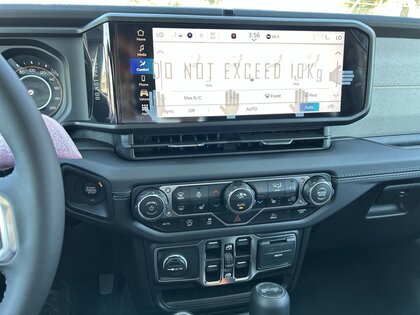 used 2025 Jeep Wrangler car, priced at $52,999