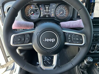 used 2025 Jeep Wrangler car, priced at $52,999